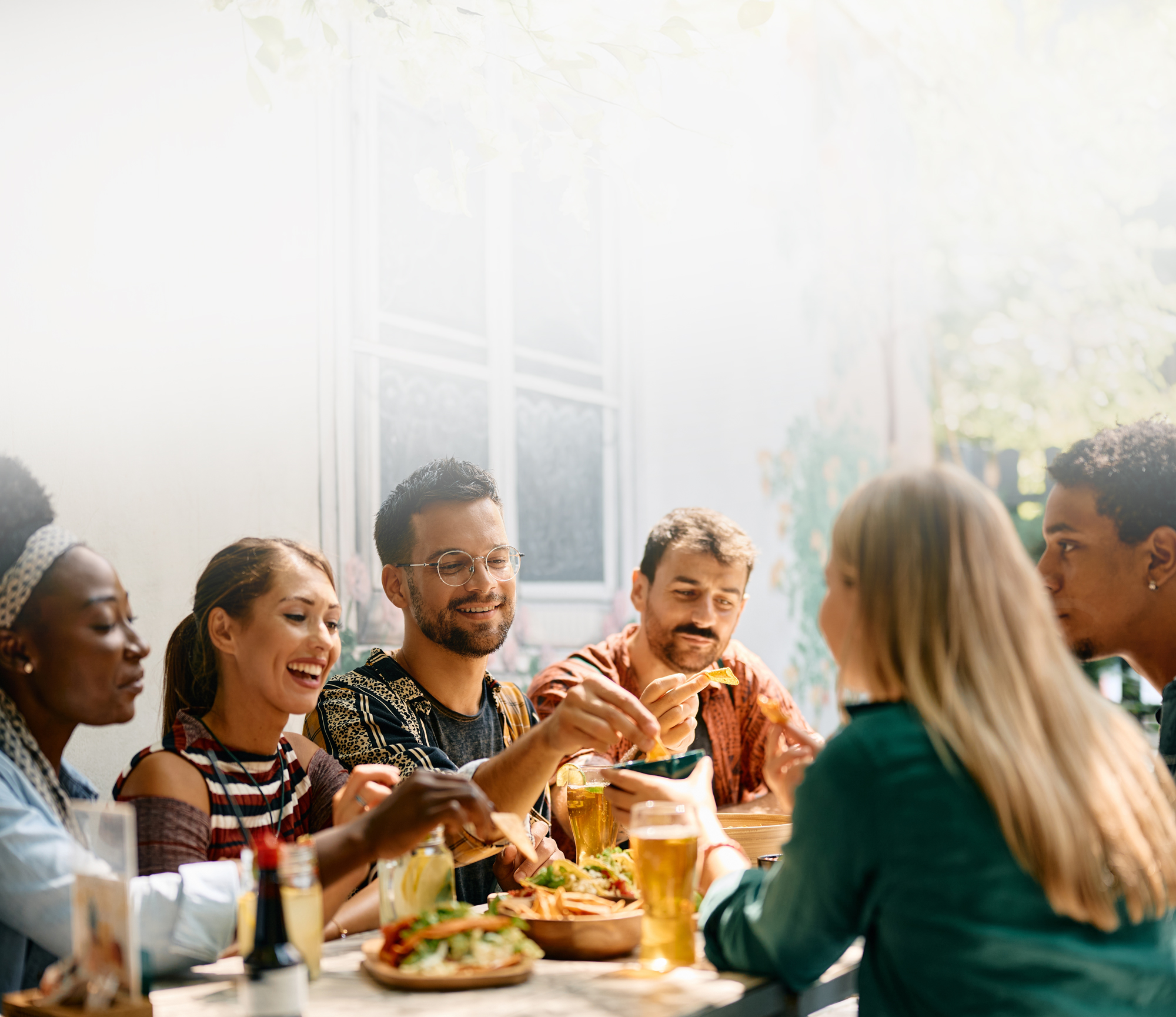 A group of friends enjoying a meal